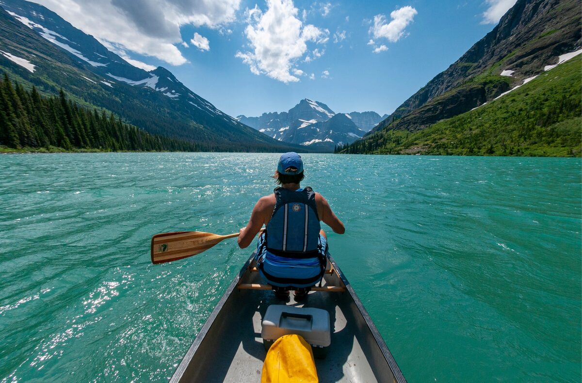Canoeing in Glacier National Park on Lake Josephine. Nikon D300S, AF DX Fisheye-Nikkor 10.5mm f/2.8G ED. Exposure: 1/800 sec., ƒ/11, ISO 200.