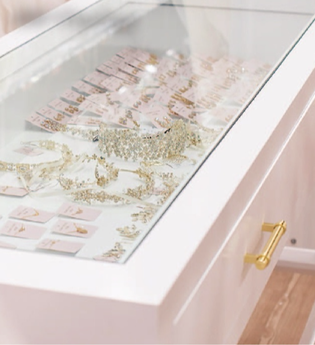 a display case with jewelry on it