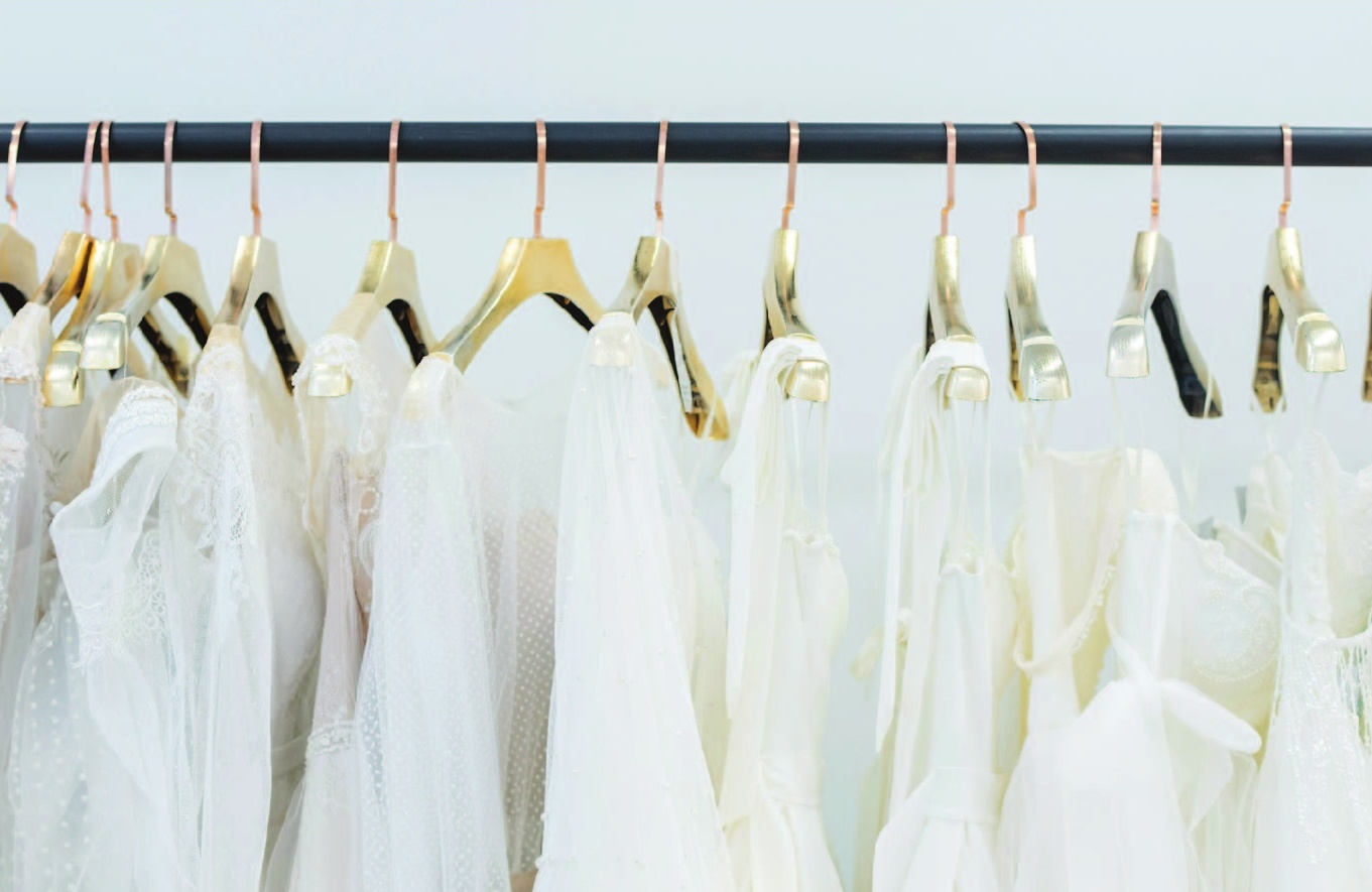 a group of white dresses on swingers