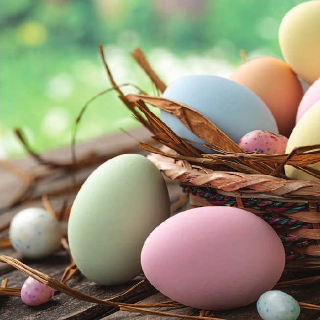 a basket of eggs and candy