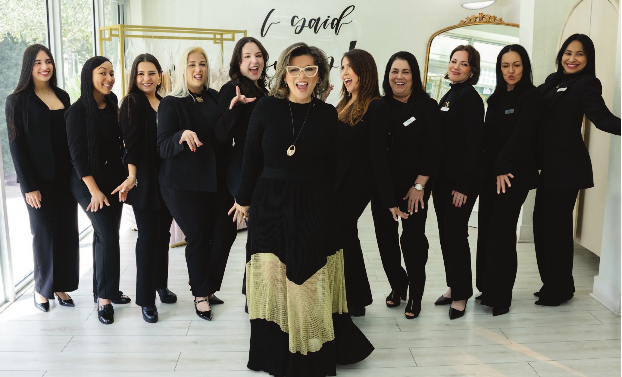 a group of women posing for a photo